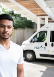 Man standing infront of an ambulance